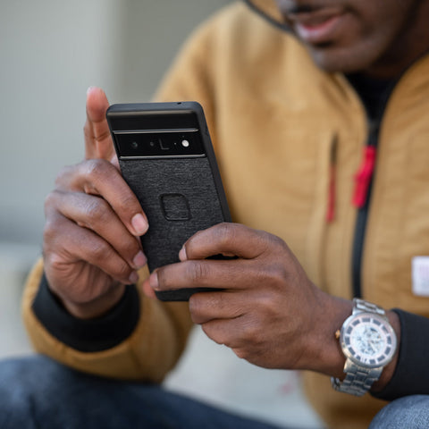 Alvin holding his Google Pixel Pro